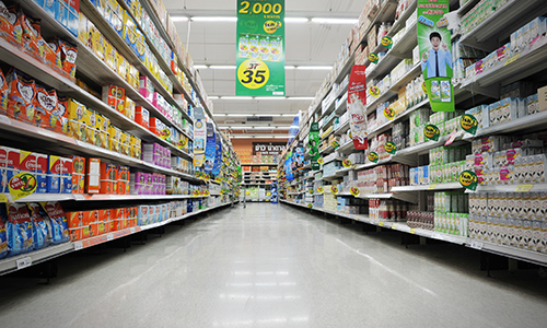 A fully stocked retail aisle — the kind of shelf placement KT Trading secures for its retail partners